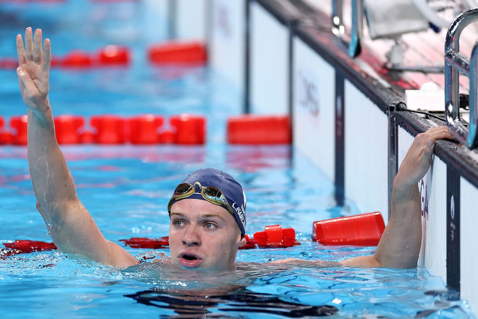 France's Léon Marchand celebrates after winning the 200-meter individual medley on Friday, August 2. It was his <a href="https://www.cnn.com/sport/live-news/paris-olympics-news-2024-08-02-24#h_fa357fc33aa32c725d7eabcf09658000"