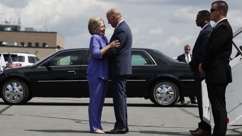 Democratic presidential nominee Hillary Clinton greets Biden on an airport tarmac in Avoca, Pennsylvania, in August 2016. <a href="http://www.cnn.com/videos/us/2016/08/17/joe-biden-endless-hug-moos-pkg-erin.cnn" target="_blank"