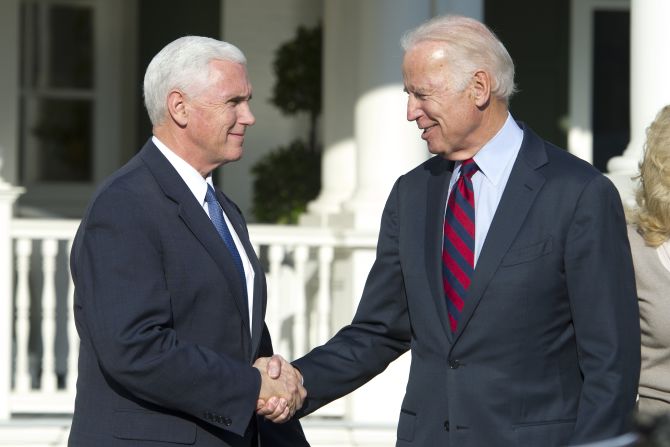 Biden shakes hands with his successor, Mike Pence, after <a href="http://www.cnn.com/2016/11/16/politics/joe-biden-mike-pence/" target="_blank"