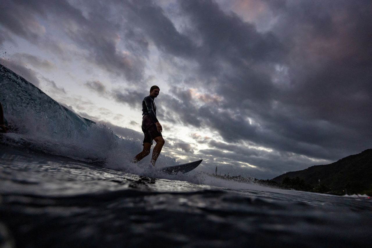 A local resident surfs a wave near the Paris 2024 Olympics surfing site in Teahupo'o, Tahiti, on Thursday.