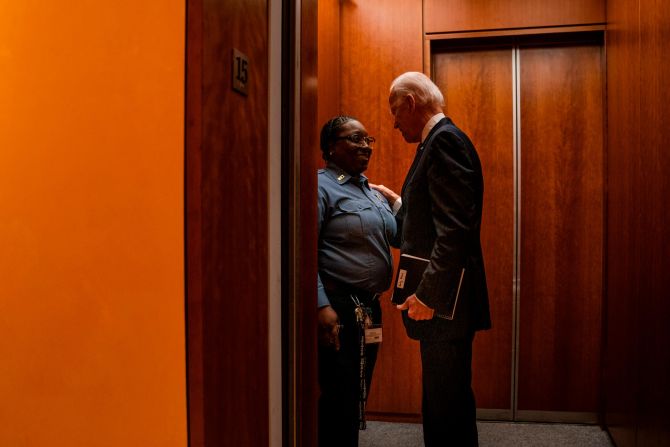 Biden speaks with Jacquelyn Brittany, a security guard at The New York Times, in December 2019. Brittany was escorting Biden to a Times editorial board meeting when she said: "I love you. I do. You're like my favorite." <a href="https://www.cnn.com/videos/politics/2020/01/21/joe-biden-elevator-selfie-new-york-times-endorsement-orig-llr.cnn" target="_blank"