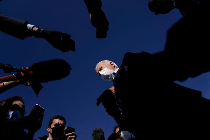 Biden speaks to reporters before boarding his campaign plane in Duluth, Minnesota, in September 2020.