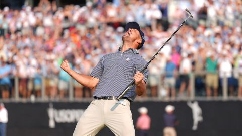 Jun 16, 2024; Pinehurst, North Carolina, USA; Bryson DeChambeau celebrates after putting on the eighteenth green to win the U.S. Open golf tournament. Mandatory Credit: Jim Dedmon-USA TODAY Sports