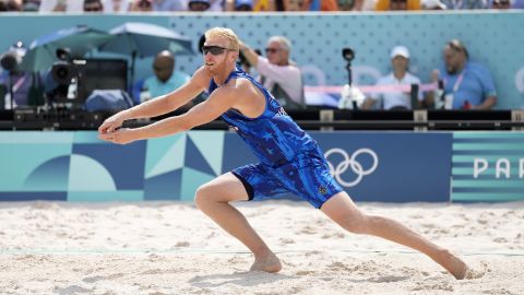 Aug 2, 2024; Paris, France; Chase Budinger (USA) sets in a match against Spain during the Paris 2024 Olympic Summer Games at Eiffel Tower Stadium. Mandatory Credit: Kyle Terada-USA TODAY Sports