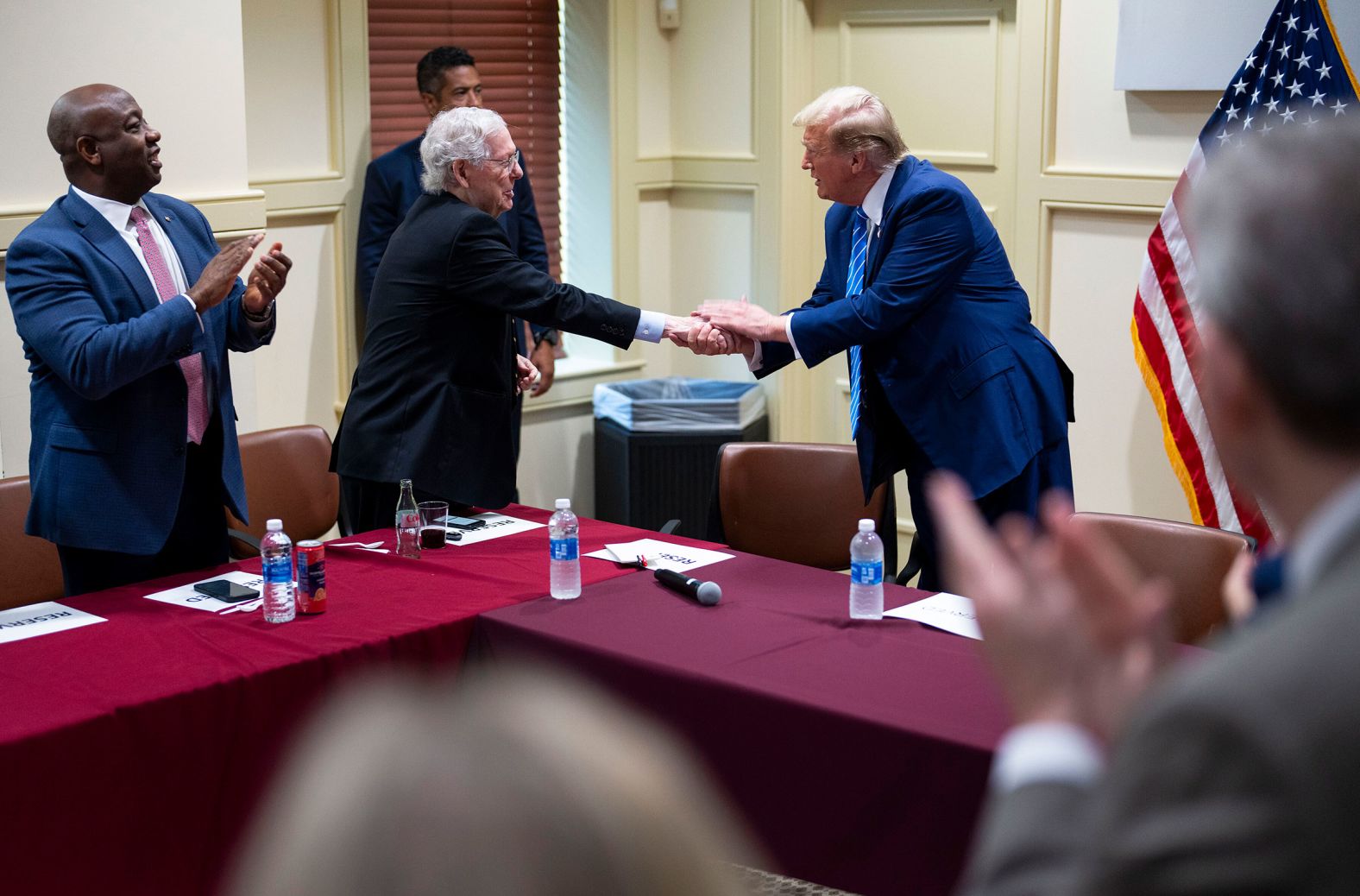 Trump shakes hands with Senate Minority Leader Mitch McConnell as he meets with GOP lawmakers in Washington, DC, on June 13. <a href="https://www.cnn.com/2024/06/13/politics/trump-closed-door-meeting-house-gop/index.html"