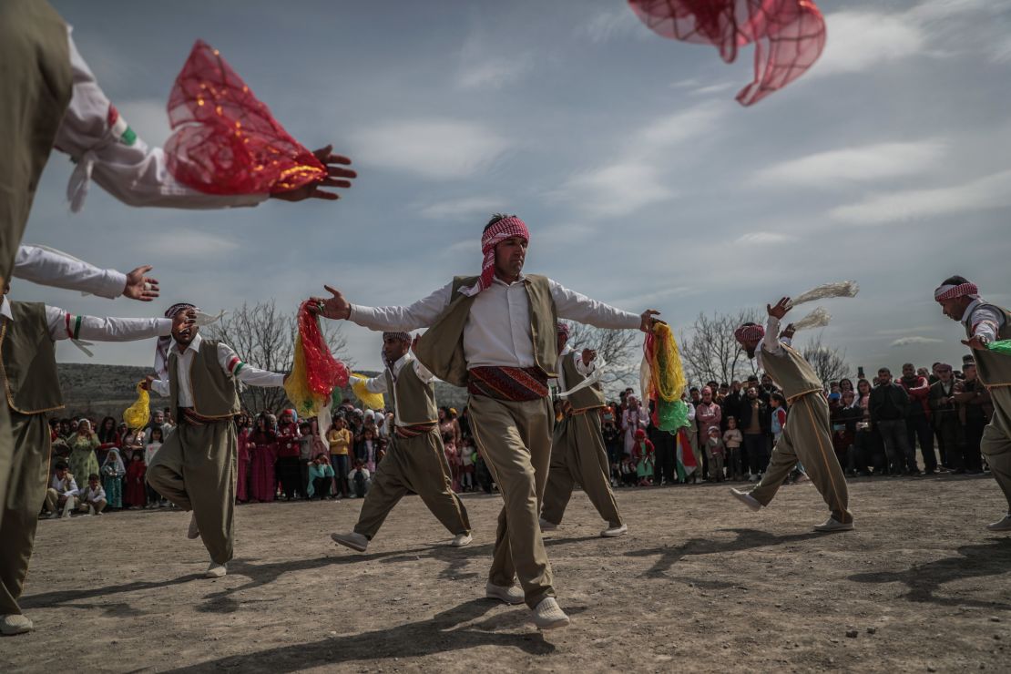 Syrian Kurds celebrate the Nowruz holiday in the city of Afrin on March 21.