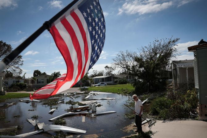 Tom Park begins cleaning up in Punta Gorda on Thursday.