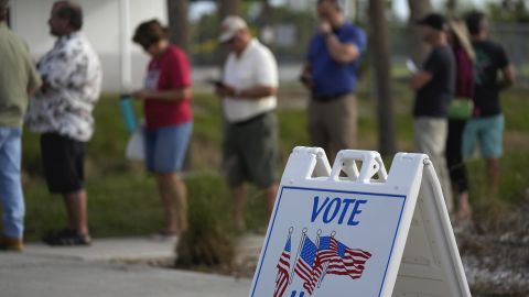 Lee County voters wait in line to cast their ballots at Wa-Ke Hatchee Recreation Center in Fort Myers, Fla, on Election Day, Tuesday, Nov. 8, 2022. After the area was devastated and thousands were left displaced by Hurricane Ian, Lee County extended their early voting period and permitted voters on Election Day to cast their ballot in any of the dozen open polling places. 