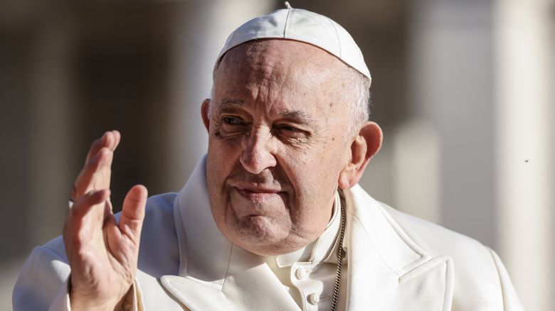 Pope Francis waves as he arrives on his popemobile to lead his weekly audience in St. Peter's Square at the Vatican, on Wednesday, March 29, 2023. Francis was hospitalized with a pulmonary infection after having difficulty breathing and will remain in treatment for several days, the Vatican said. Photographer: Alessia Pierdomenico/Bloomberg via Getty Images