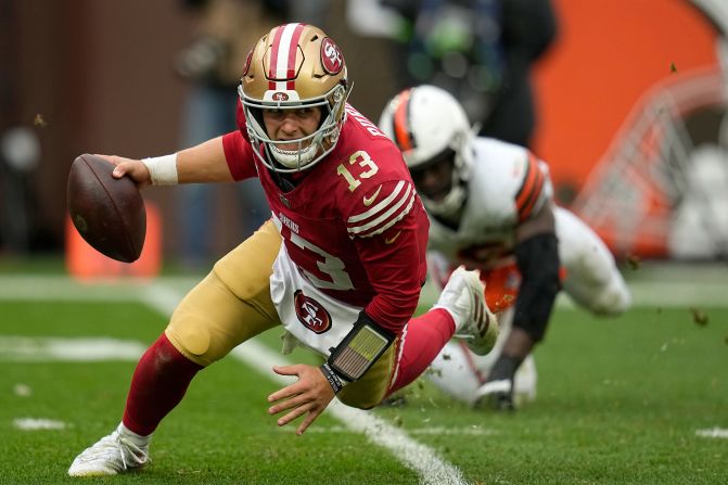 San Francisco 49ers quarterback Brock Purdy scrambles away from Cleveland Browns linebacker Jeremiah Owusu-Koramoah during the second half of the 49ers' 19-17 loss on Sunday, October 15.