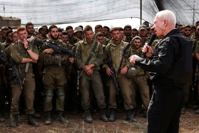 Israel's Defense Minister Yoav Gallant meets soldiers in a field near Israel's border with Gaza on October 19. <a href="https://www.cnn.com/2023/10/19/middleeast/israel-gaza-hamas-war-thursday-intl-hnk/index.html" target="_blank"