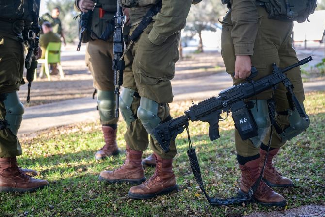 Soldiers from the IDF's coed infantry battalion 'Bardelas' guard an Israeli community in Southern Israel on November 5.