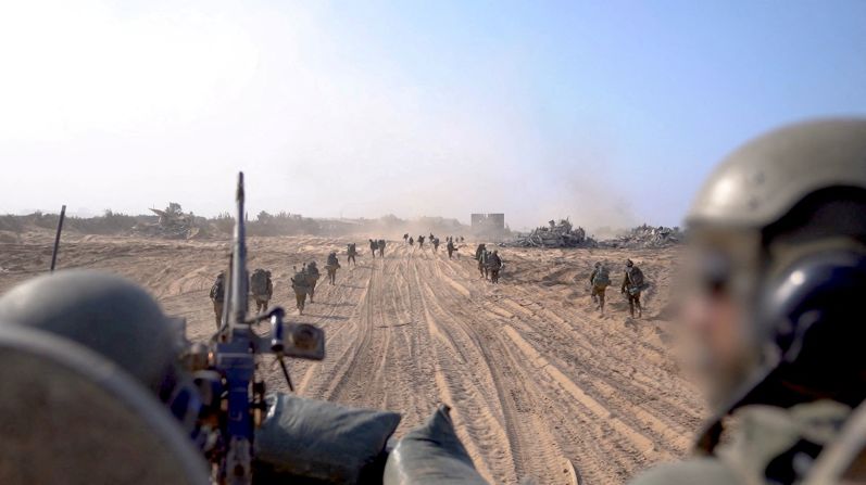 Soldiers are seen walking at a location given as Gaza, in this screengrab obtained from an Israel Defence Forces handout video released on November 5.