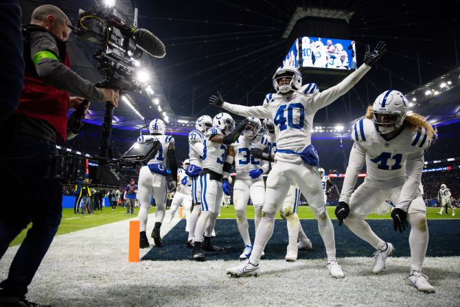 Indianapolis Colts safety Julian Blackmon celebrates with teammates after intercepting the ball during the Colts' 10-6 victory over the New England Patriots in Frankfurt, Germany, on Sunday, November 12. 