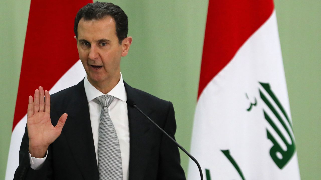 Syria's President Bashar al-Assad speaks during a press conference with Iraq's Prime Minister in Damascus on July 16, 2023 (Photo by LOUAI BESHARA / AFP)