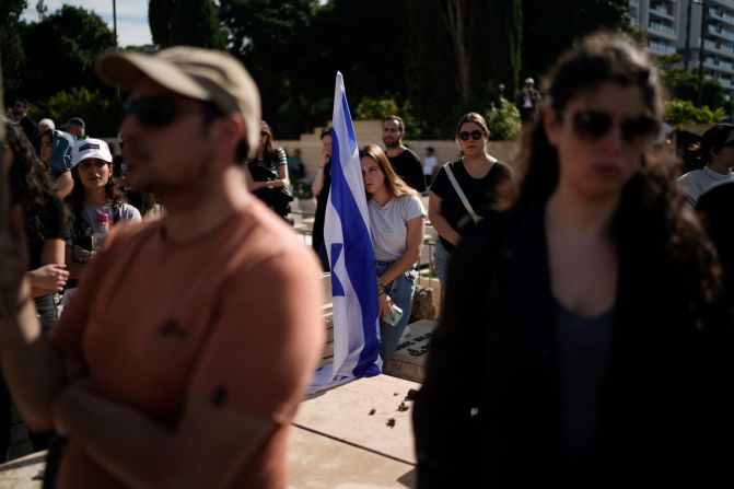 Mourners attend the funeral of Israeli soldier Master Sgt. Gal Meir Eisenkot, 25, <a href="https://www.cnn.com/2023/12/07/middleeast/israel-idf-war-cabinet-son-killed-gaza-intl/index.html" target="_blank"