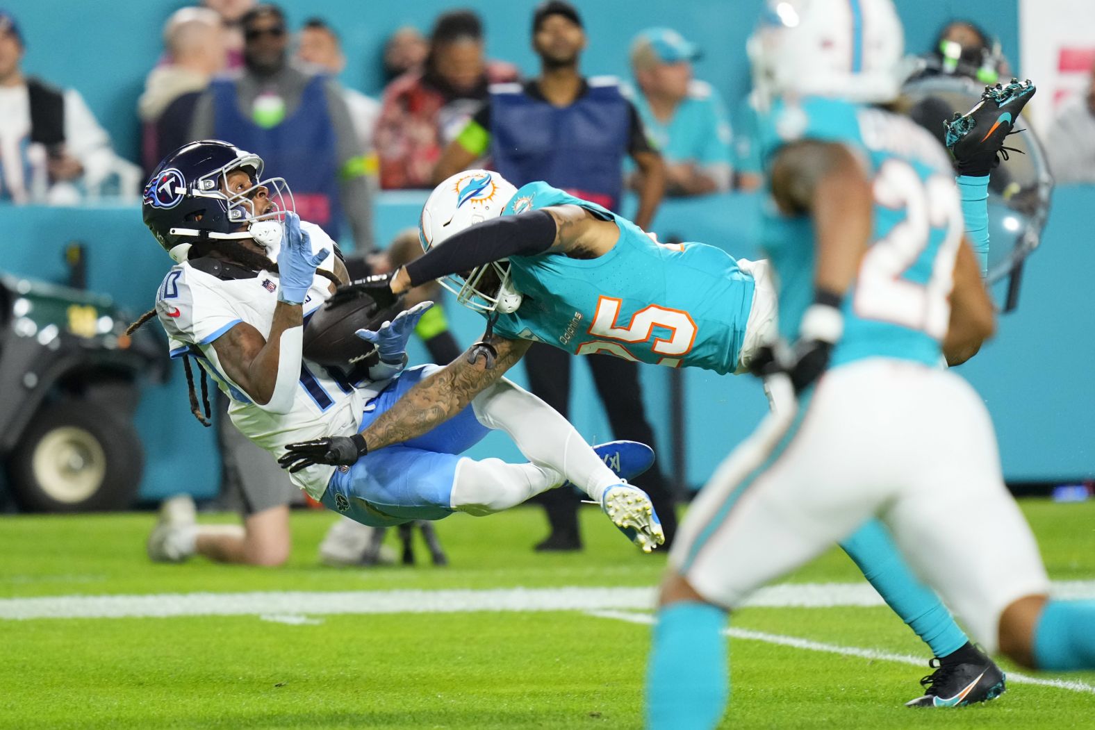 Tennessee Titans wide receiver DeAndre Hopkins catches a pass during a Monday Night Football game against Miami on December 11. The Titans trailed 27-13 with 3:08 left in the fourth quarter, but <a href="https://www.cnn.com/2023/12/12/sport/dolphins-titans-giants-packers-week-14-nfl-spt-intl/index.html" target="_blank"