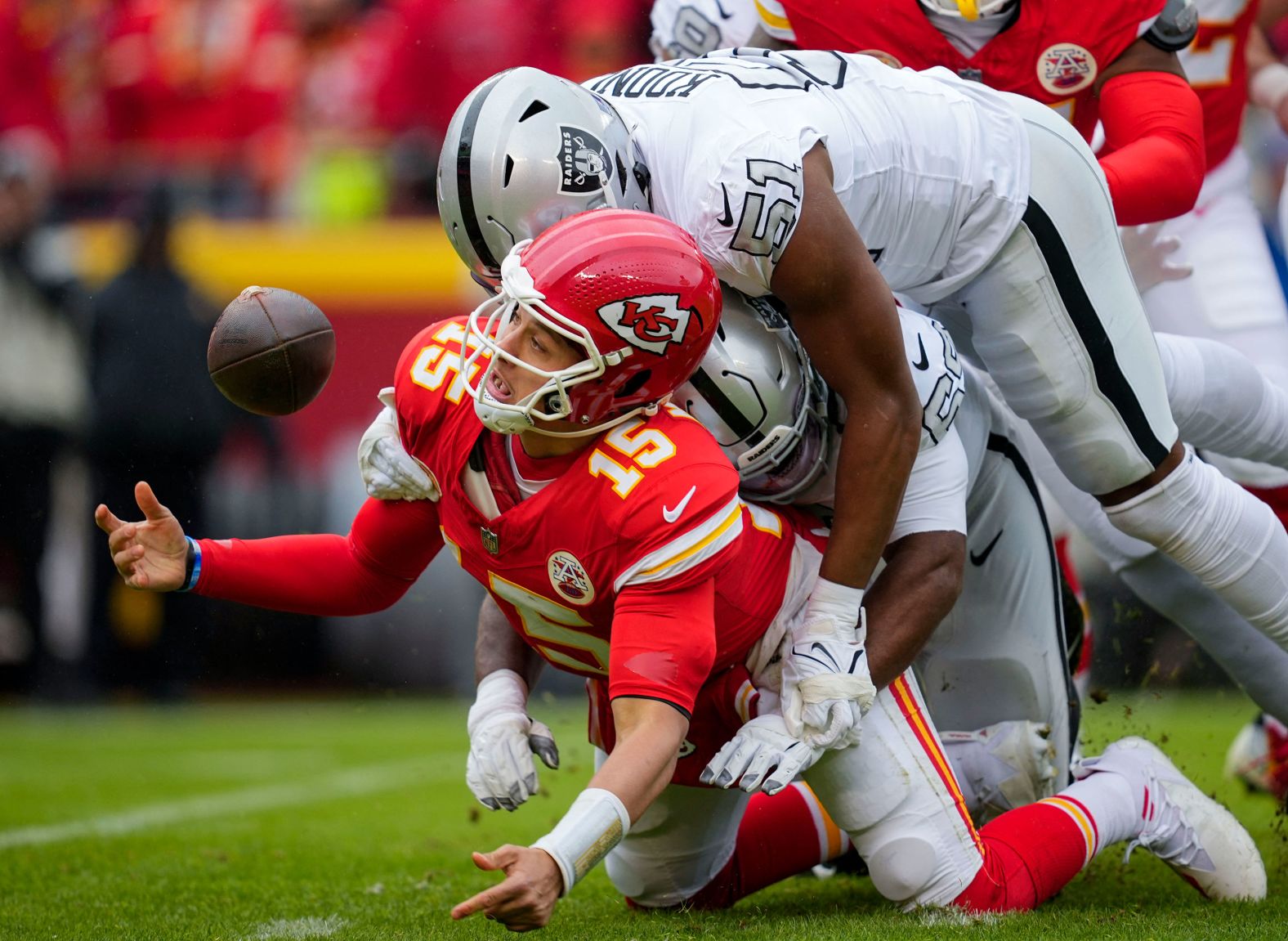 Kansas City Chiefs quarterback Patrick Mahomes recovers his fumble as he is hit during the <a href="https://www.cnn.com/2023/12/27/sport/kansas-city-chiefs-las-vegas-raiders-spt-intl/index.html" target="_blank"