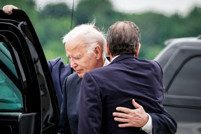 Biden embraces his son Hunter on a tarmac in Wilmington, Delaware, in June 2024. A federal jury <a href="https://www.cnn.com/2024/06/11/politics/hunter-biden-gun-trial-verdict" target="_blank"