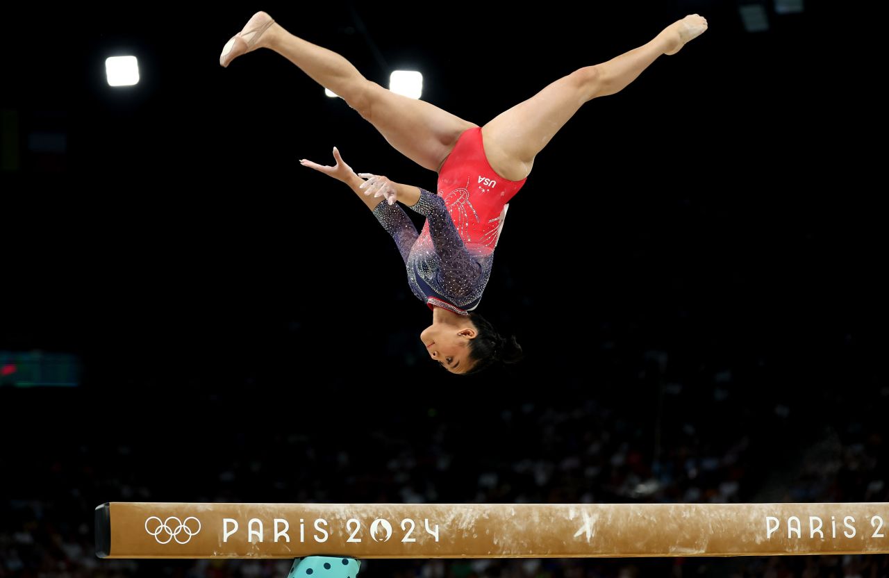 Suni Lee competes on the balance beam on Thursday.