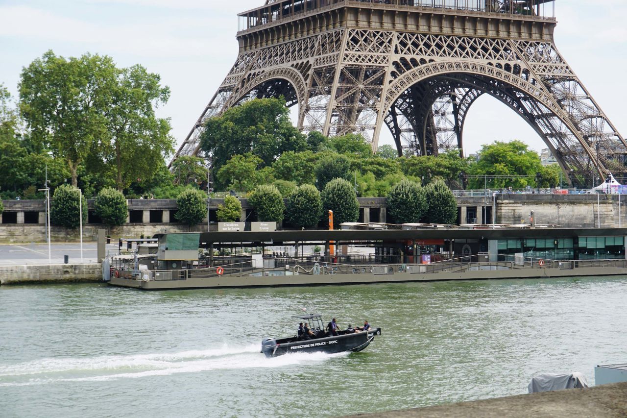 Security personnel patrol along the River Seine in Paris on July 25. 