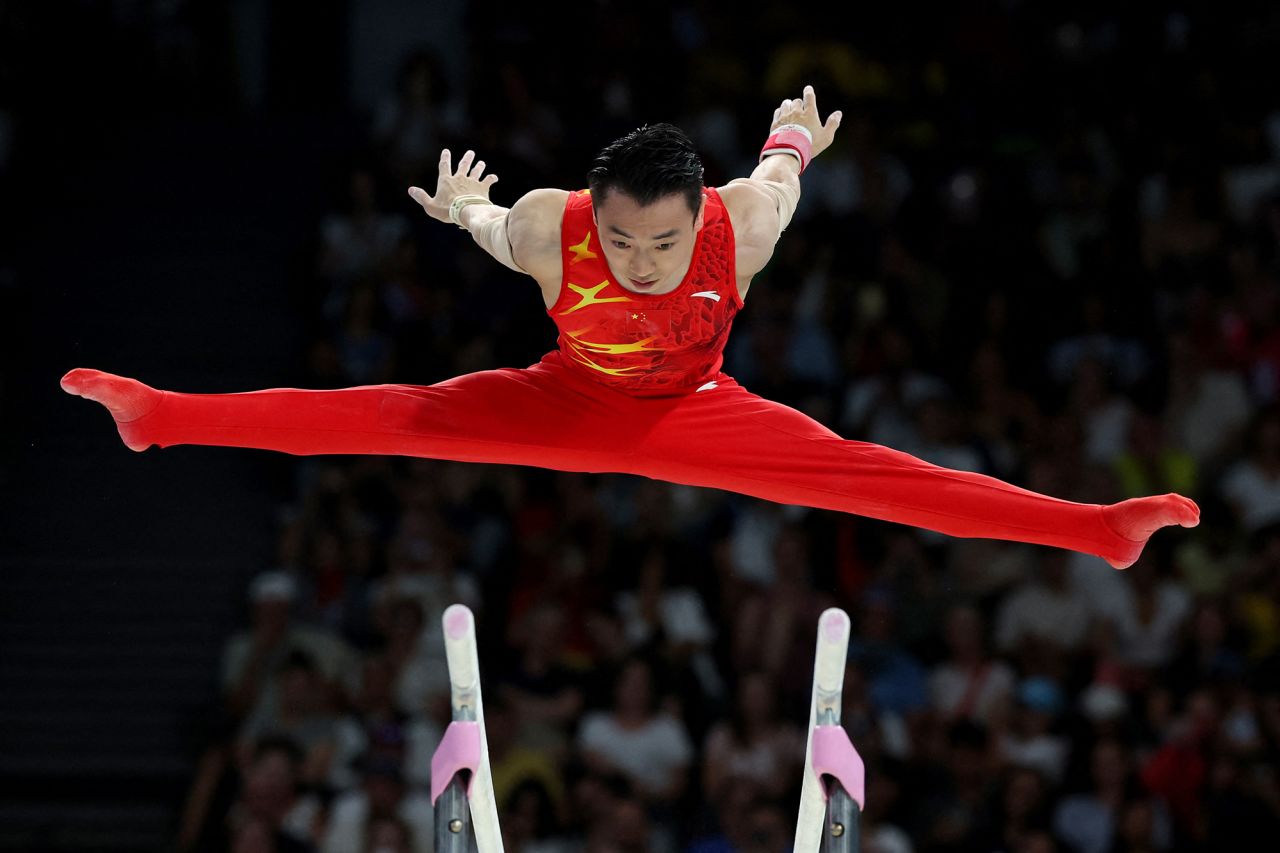 Zou Jingyuan of China in action on the parallel bars at the Bercy Arena, Paris, France, on August 5.