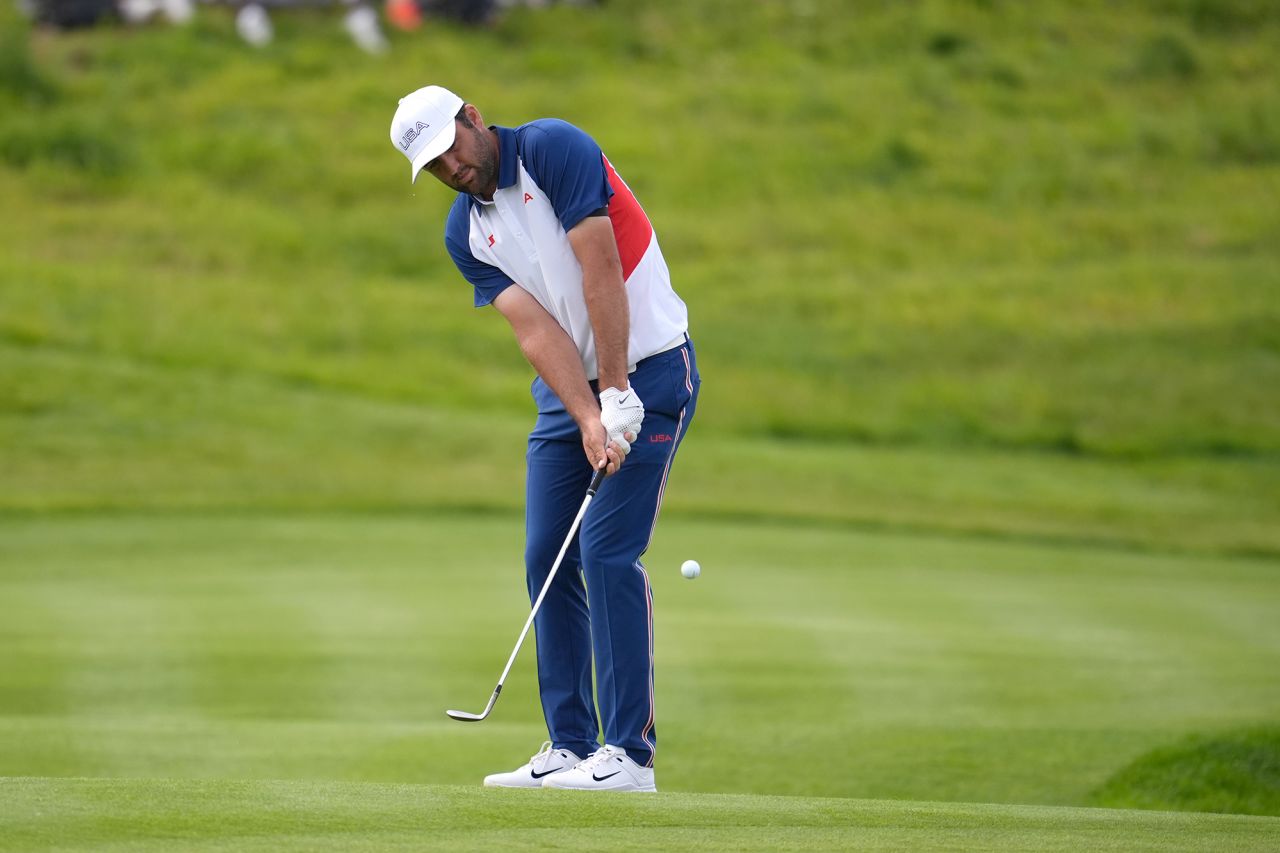 USA’s Scottie Scheffler chips onto the second green during the final round of the men's golf on August 4.