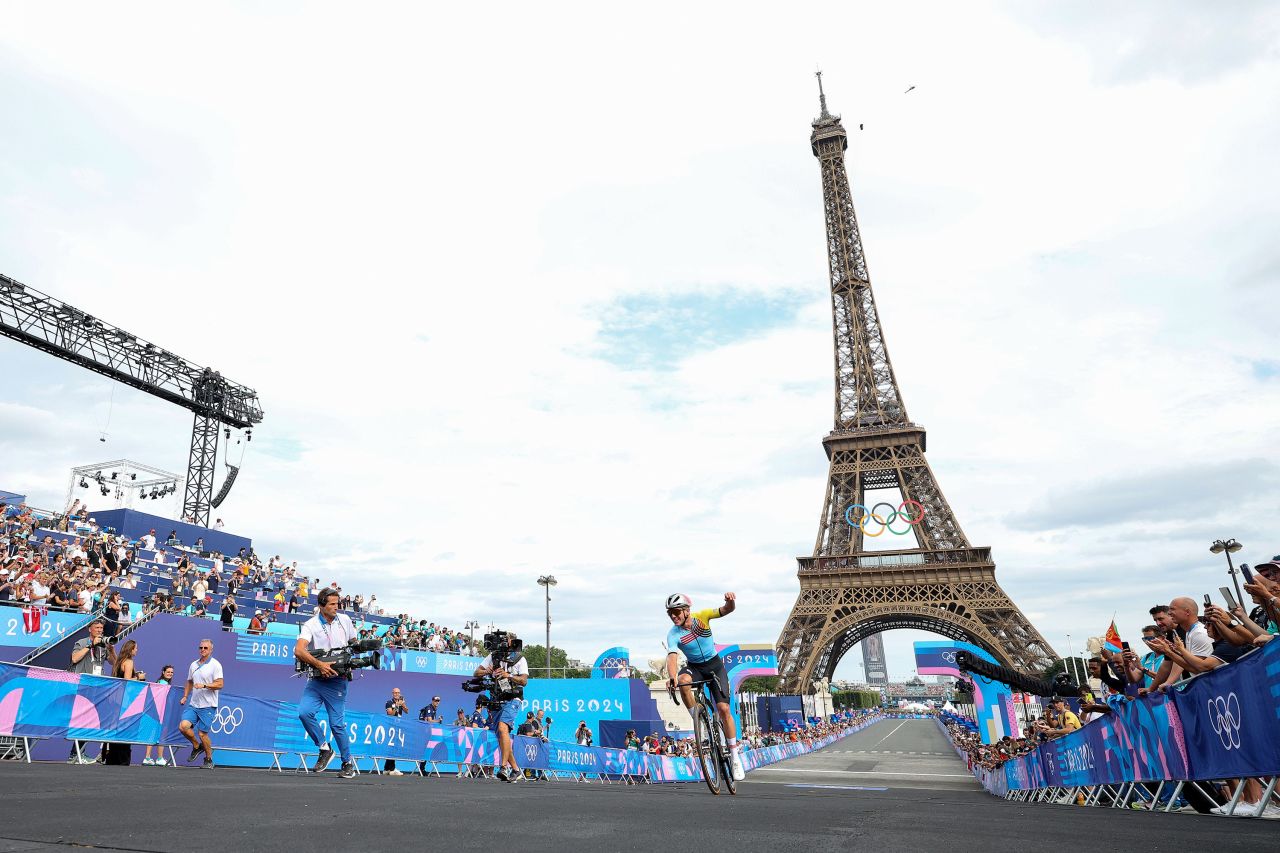 Belgium's Remco Evenepoel celebrates at finish line after winning the the men's road race Saturday. 