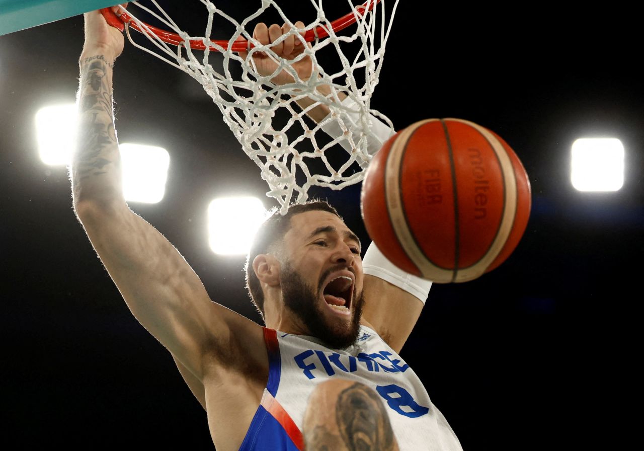 Isaïa Cordinier of France scores a basket against Canada on Tuesday.