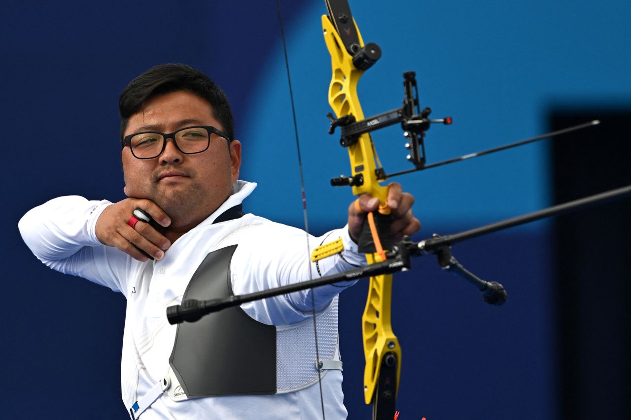 South Korea's Kim Woo-jin releases an arrow in the men's archery individual elimination round on August 4. 