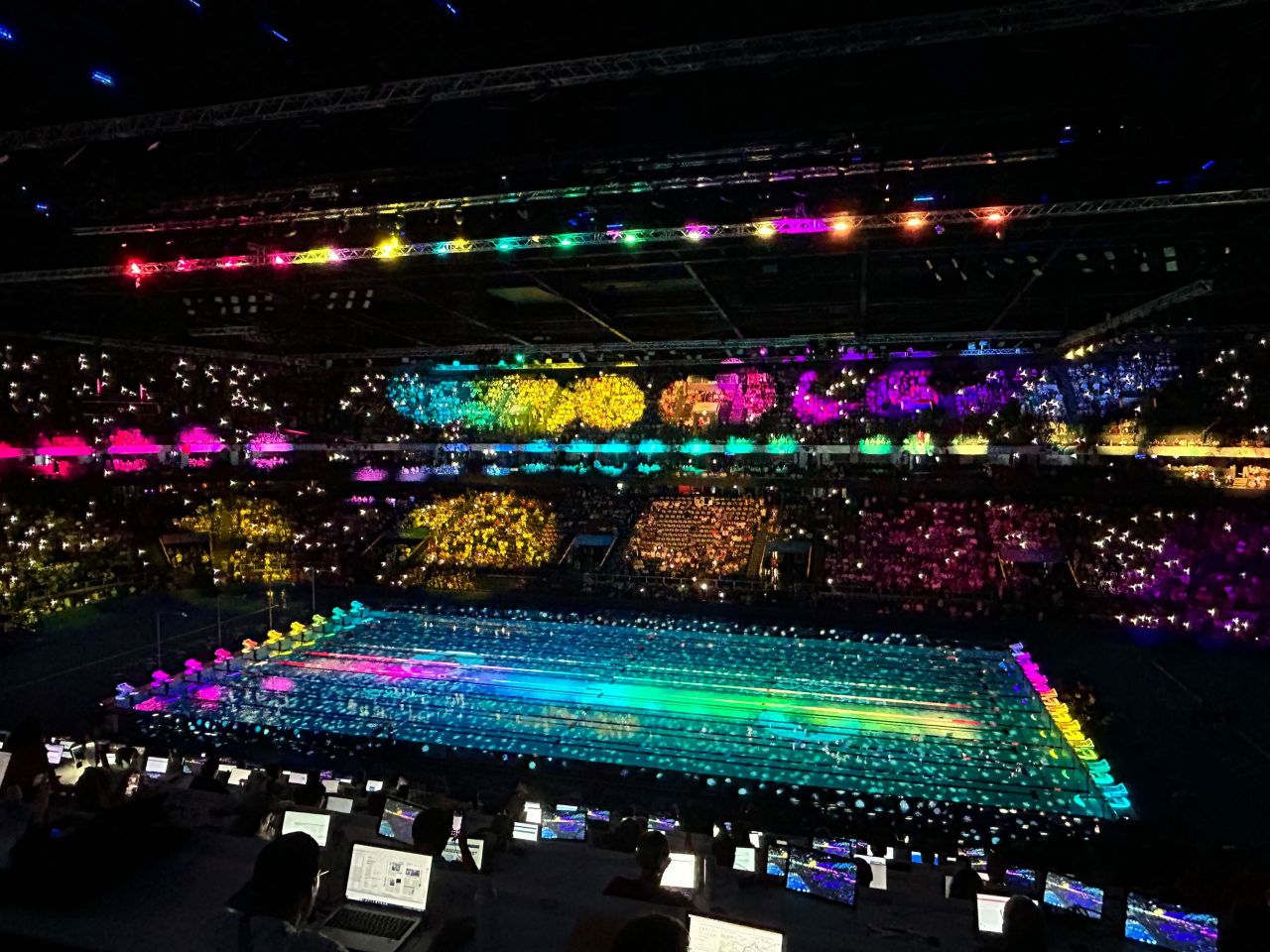 La Defénse Arena is lit up in rainbow colors during a light show ahead of races Saturday evening. 