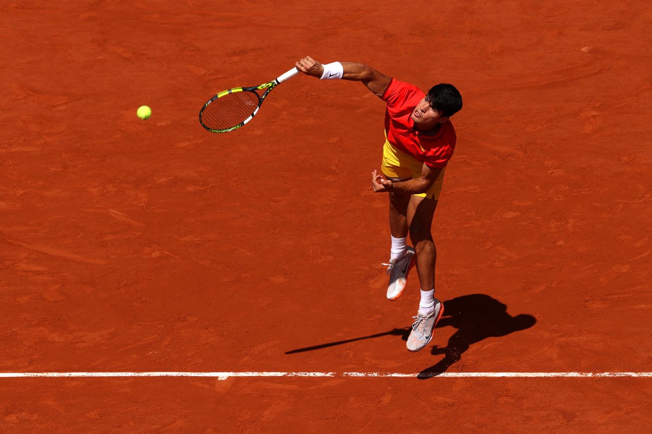 Spain’s Carlos Alcaraz serves during the men's singles match against Serbia’s Novak Djokovic on August 4. 