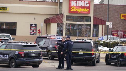 Police work on the scene outside of a King Soopers grocery store where a shooting took place on March 22, 2021, in Boulder, Colo. The man charged with killing 10 people at the Colorado supermarket last year remains mentally incompetent to stand trial, according to experts at the state mental hospital. Their findings about the mental health of Ahmad Al Aliwi Alissa, 23, were disclosed during a short court hearing Thursday, July 21, 2022. (AP Photo/David Zalubowski, File)