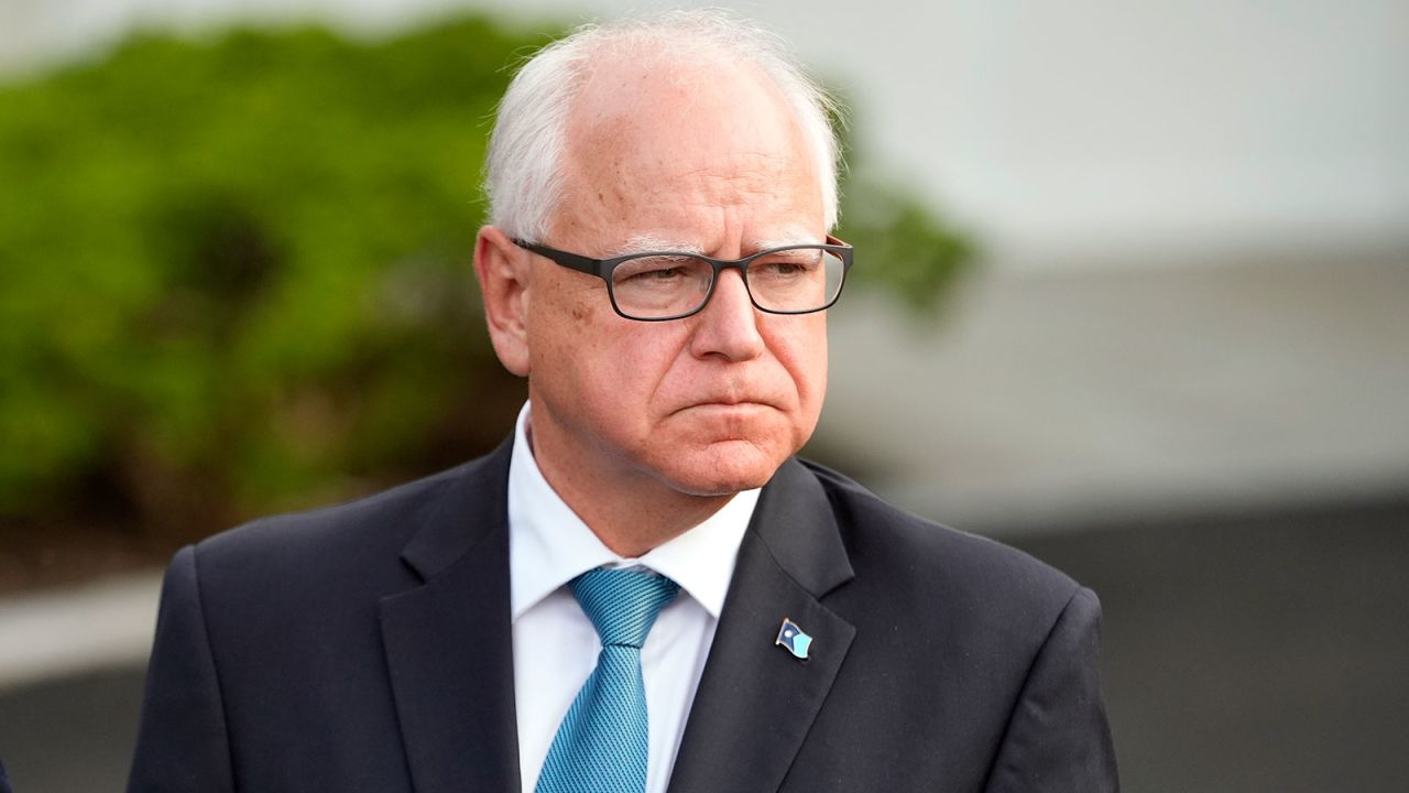 Minnesota Gov. Tim Walz listens as Maryland speaks to reporters after meeting with President Joe Biden, Wednesday, July 3, 2024, at the White House in Washington. (AP Photo/Jacquelyn Martin)