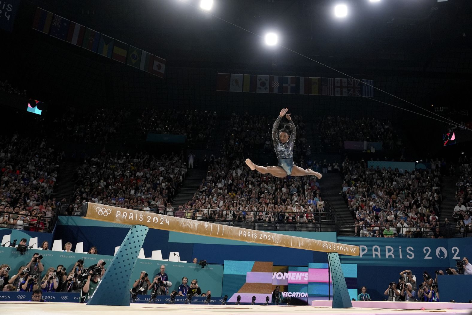 US gymnast Simone Biles competes on the balance beam during the Olympic qualification round on July 28. <a href="https://www.cnn.com/2024/07/28/sport/simone-biles-return-paris-olympics-2024-spt-intl/index.html"