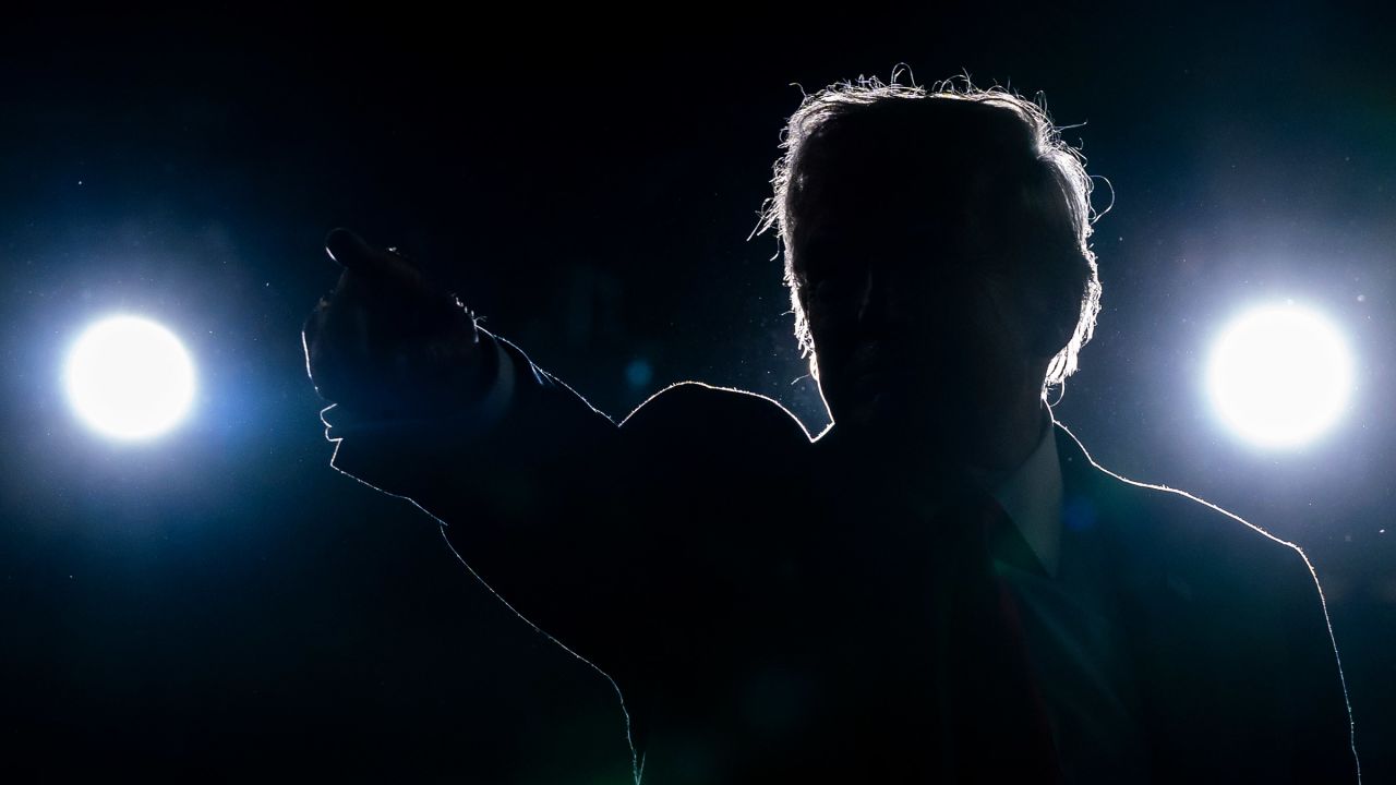 Republican presidential candidate and former President Donald Trump points to supporters after speaking at a campaign rally in Harrisburg, Pennsylvania on July 31, 2024.