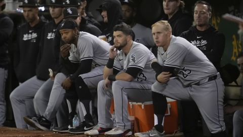 Chicago White Sox players react from the dugout during the eighth inning of a baseball game against the Oakland Athletics in Oakland, Calif., Monday, Aug. 5, 2024. (AP Photo/Jeff Chiu)