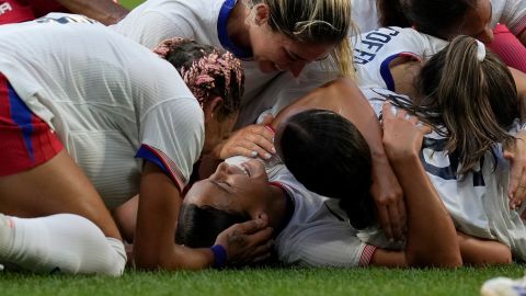 United States' Sophia Smith celebrates with team mates the opening goal during a women's semifinal soccer match between the United States and Germany at the 2024 Summer Olympics, Tuesday, Aug. 6, 2024, at Lyon Stadium in Decines, France. (AP Photo/Silvia Izquierdo)