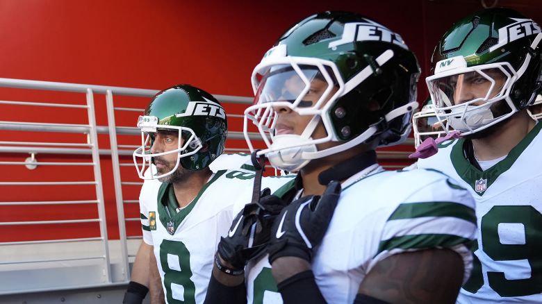 New York Jets quarterback Aaron Rodgers (8) and teammates wait in a tunnel before an NFL football game against the San Francisco 49ers in Santa Clara, Calif., Monday, Sept. 9, 2024. (AP Photo/Godofredo A. Vásquez)