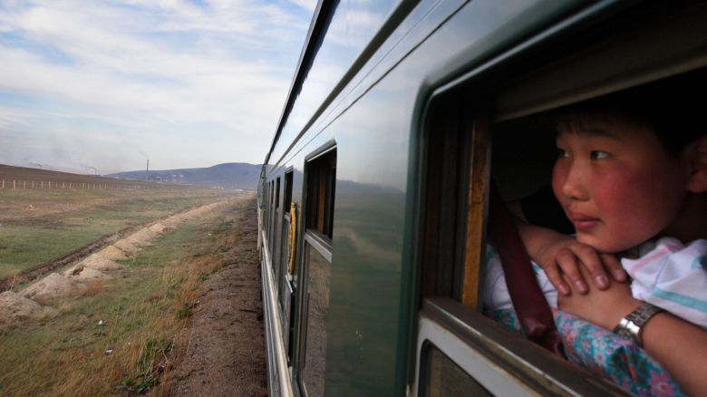 AXMTR2 The Trans-Mongolian train leaves Ulaan Baator, Mongolia en route to Siberia, Russia.. Image shot 2005. Exact date unknown.