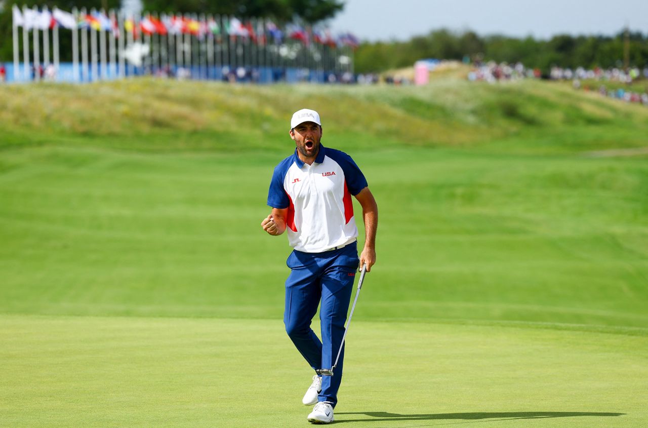 USA’s Scottie Scheffler celebrates during the men’s golf competition on Sunday. 