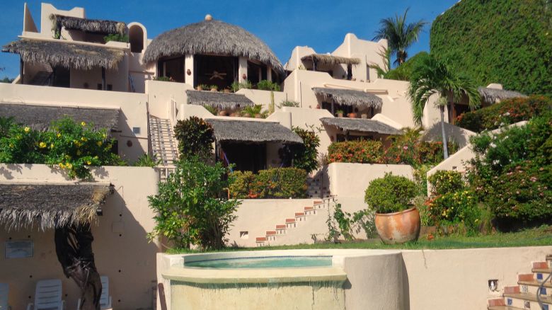 The ocean-facing side of Rick and Brooke Gazer’s B&B in Huatulco, Mexico, featuring guest rooms.