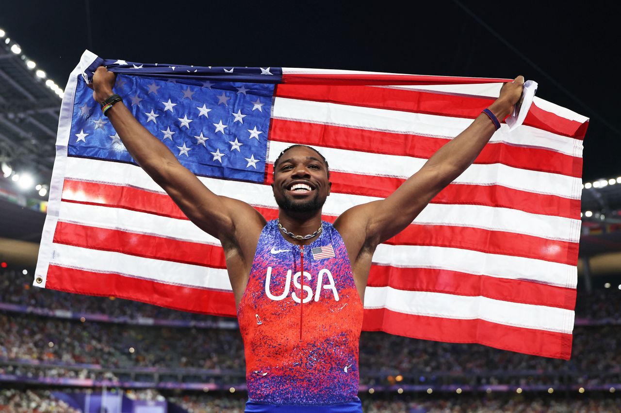 American sprinter Noah Lyles celebrates winning the gold medal in the men's 100-meter final Sunday evening. 