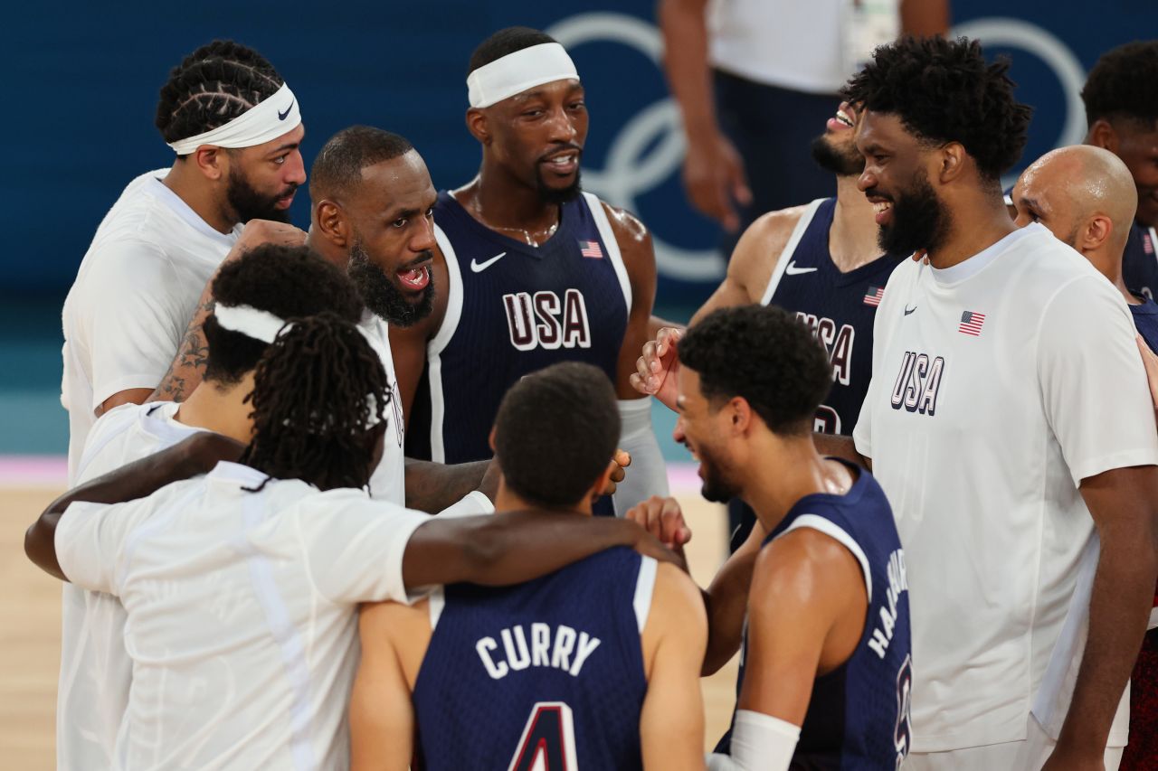 Team USA huddles after their victory against Brazil in Paris, on August 6.