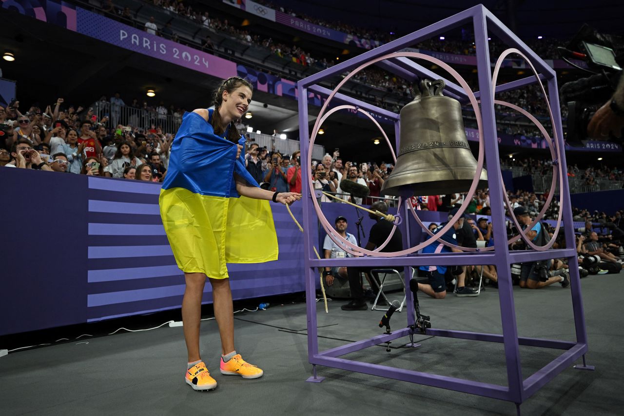 Gold medallist Yaroslava Mahuchikh of Ukraine rings the bell after winning the women's high jump final Sunday. 