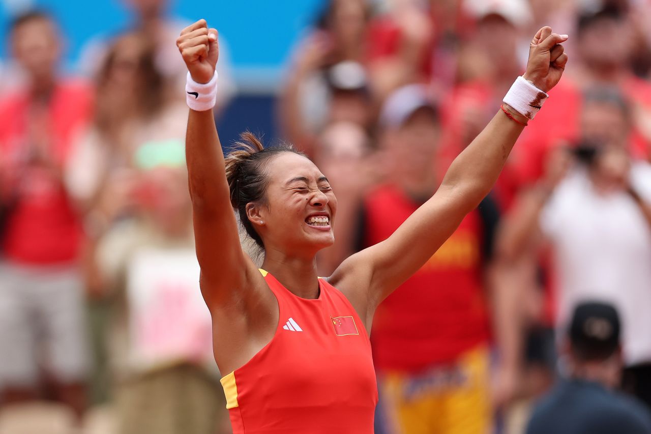 China’s Zheng Qinwen celebrates during the women's singles tennis match against Croatia’s Donna Vekić on August 3.