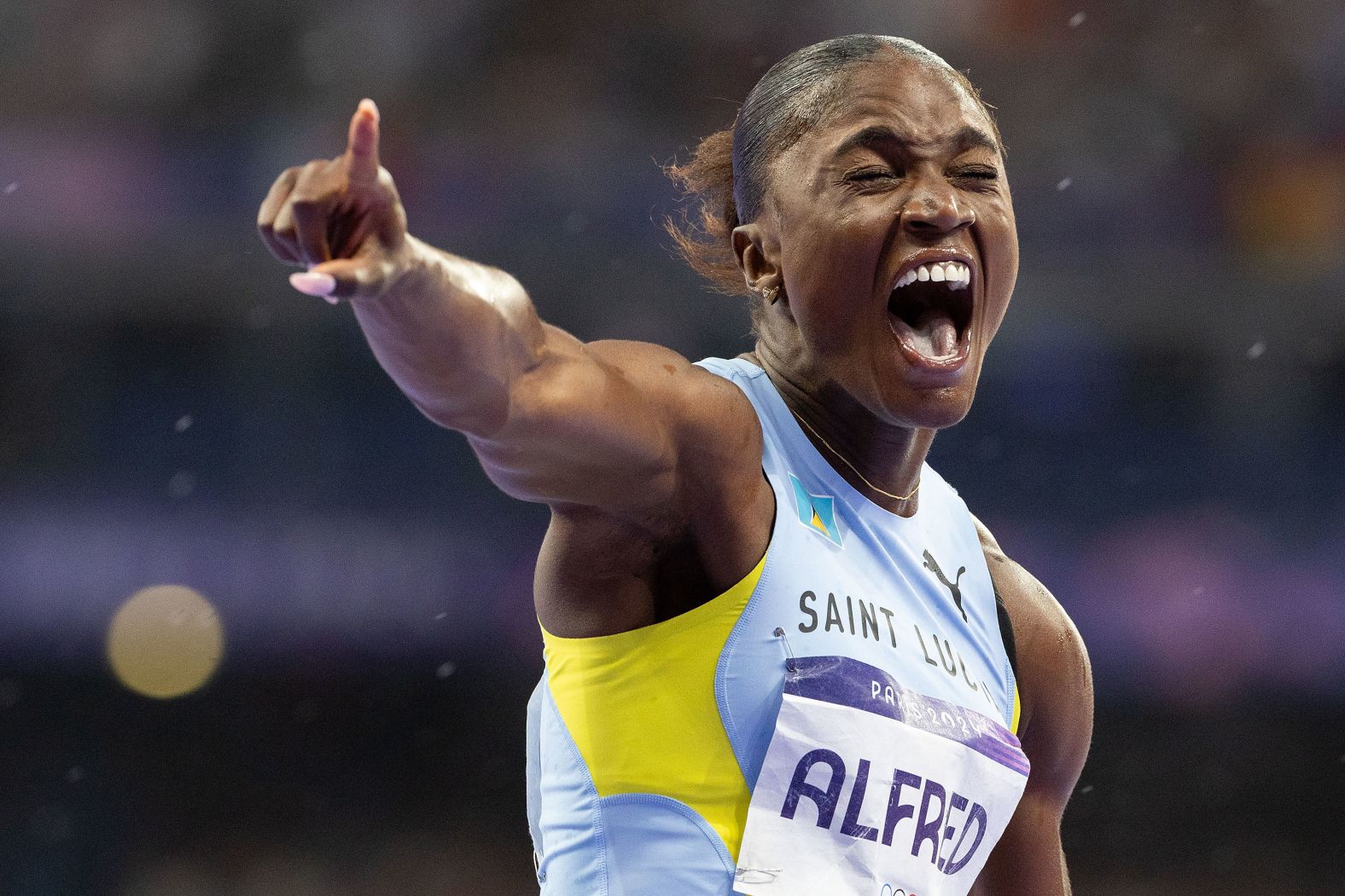 Saint Lucia's Julian Alfred celebrates after <a href="https://www.cnn.com/sport/live-news/paris-olympics-news-2024-08-03#h_40dc9ed1a9773dbb45d0bdbbdf57d1ea"