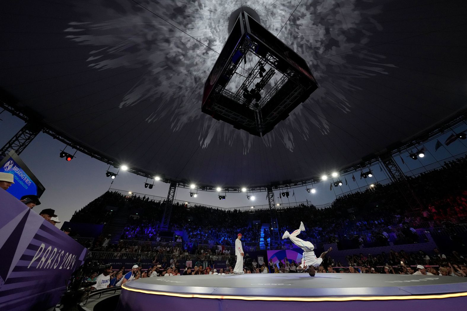 France's Danis Civil, known as B-Boy Dany Dann, right, and Canada's Philip Kim, known as B-Boy Phil Wizard, compete in the gold medal battle in the men's breaking competition August 10. Kim won the battle.