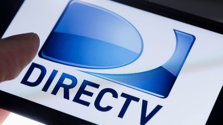 BERLIN, GERMANY - OCTOBER 07: In this photo illustration the logo of American direct broadcast satellite service provider DirecTV is displayed on a smartphone on October 07, 2019 in Berlin, Germany. (Photo Illustration by Thomas Trutschel/Photothek via Getty Images)