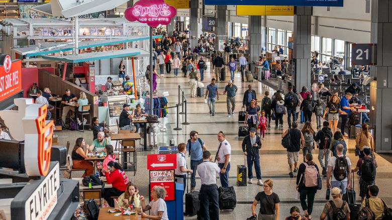 AUSTIN, TEXAS - AUGUST 31: People travel through the Austin-Bergstrom International Airport on August 31, 2023 in Austin, Texas. The FAA has projected Thursday to be the busiest day in U.S. airspace with over 50,000 flights scheduled ahead of the Labor Day weekend. (Photo by Brandon Bell/Getty Images)